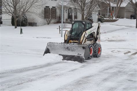 using a skid steer for snow removal|best bobcat for snow removal.